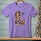 Purple t-shirt with mermaid, octopus, hairbrush, and text "THE SALT STAYS".