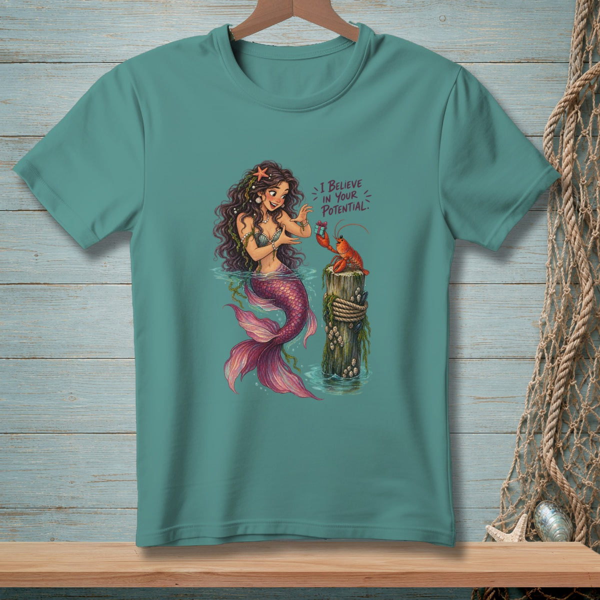 Mermaid with lobster on post, text reads "I BELIEVE IN YOUR POTENTIAL."