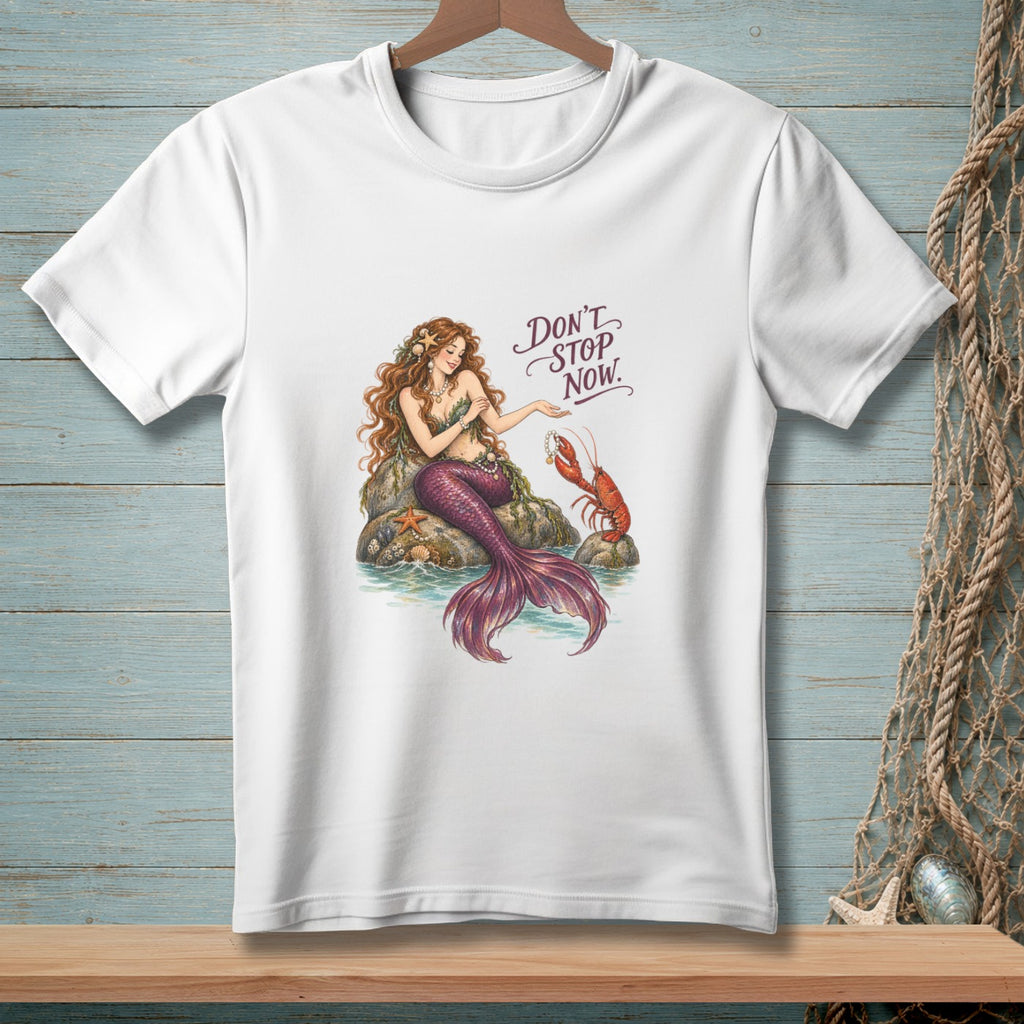 White t-shirt with illustration of a mermaid and lobster, text reads "DON'T STOP NOW."