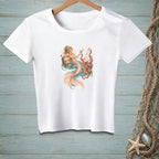White t-shirt with mermaid and octopus artwork, holding a cocktail and a list.