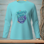 Light blue long-sleeve shirt with "Mermaid Mode: Do Not Disturb" text and mermaid tail graphic.