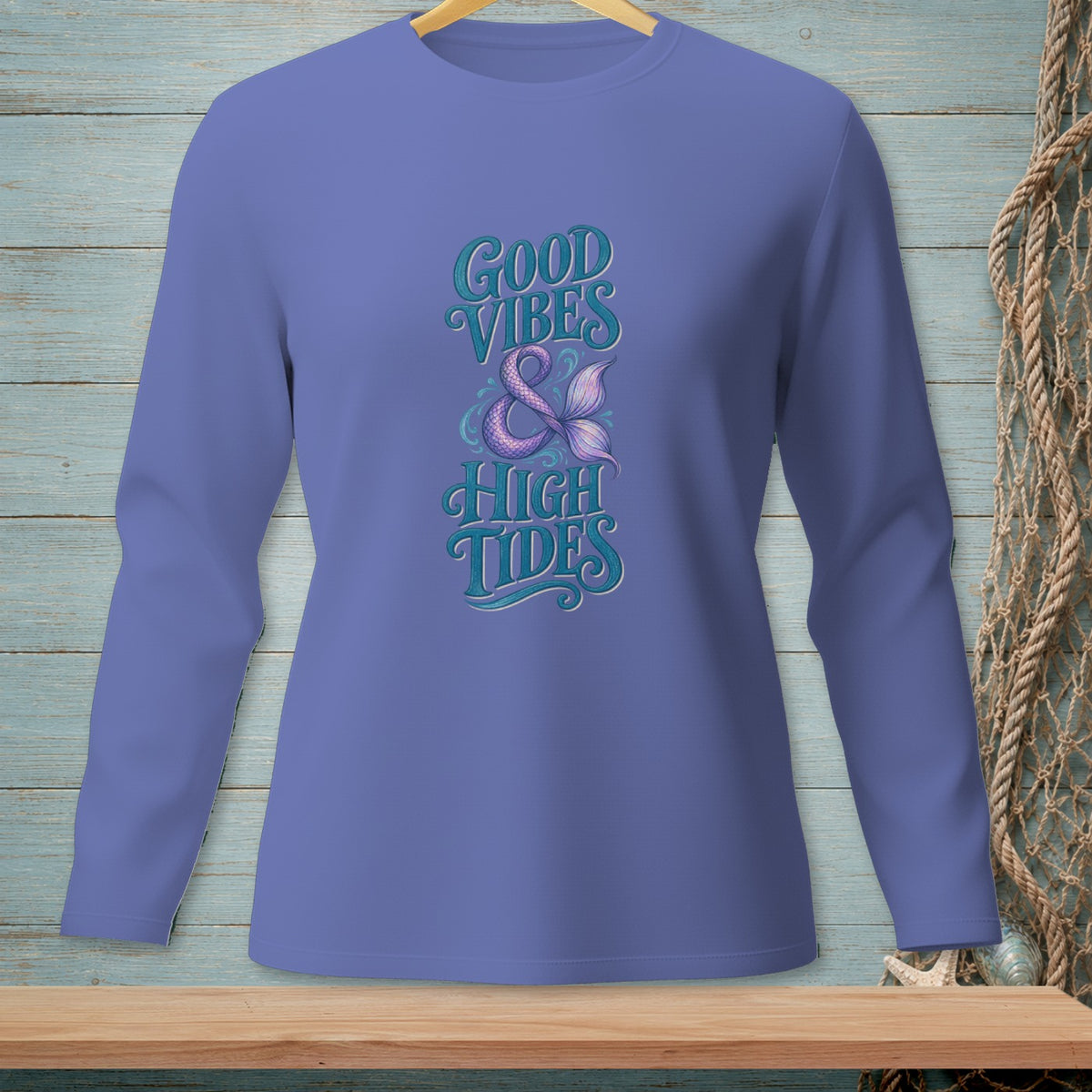 Purple long-sleeve shirt with "Good Vibes & High Tides" and mermaid tail graphic.