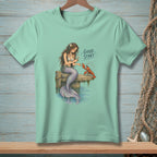 Mermaid with flower and lobster on dock, text reads "GOOD START."