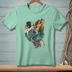 Mint t-shirt graphic featuring a mermaid lounging by a boat with a bottle of champagne.