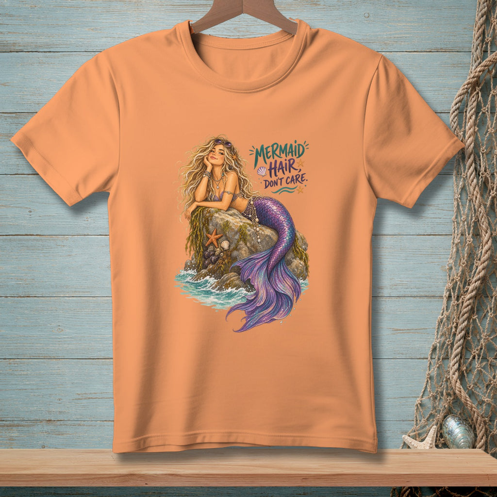 Orange t-shirt with mermaid graphic that reads "Mermaid Hair Don't Care."