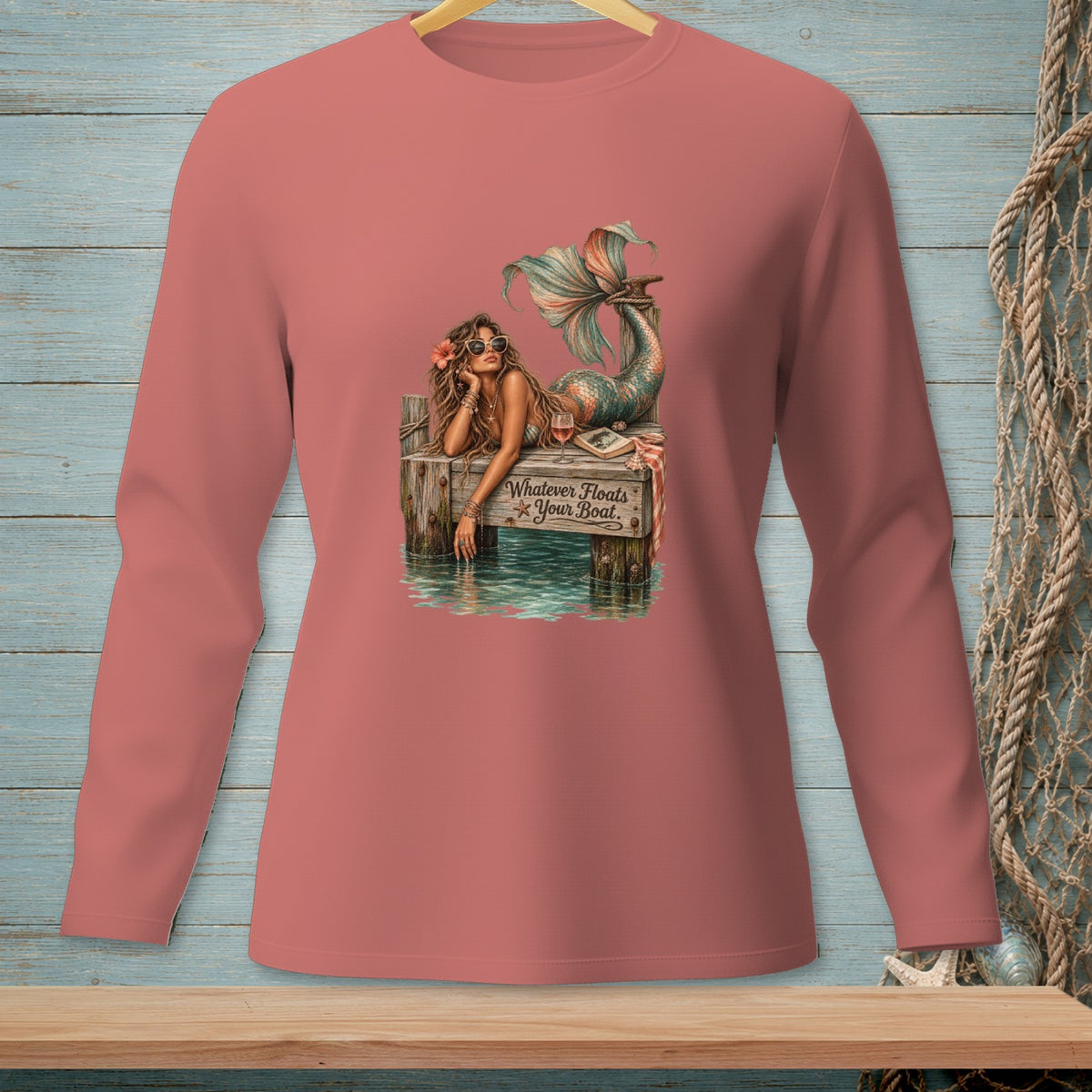 Mermaid on dock with text "Whatever Floats Your Boat"