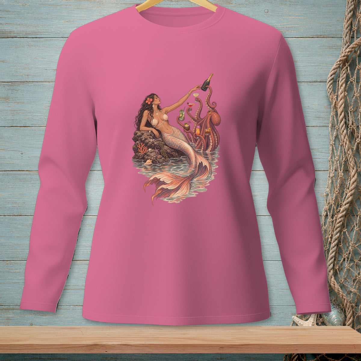 Mermaid pouring champagne with octopus and cocktails on a pink long-sleeve shirt.