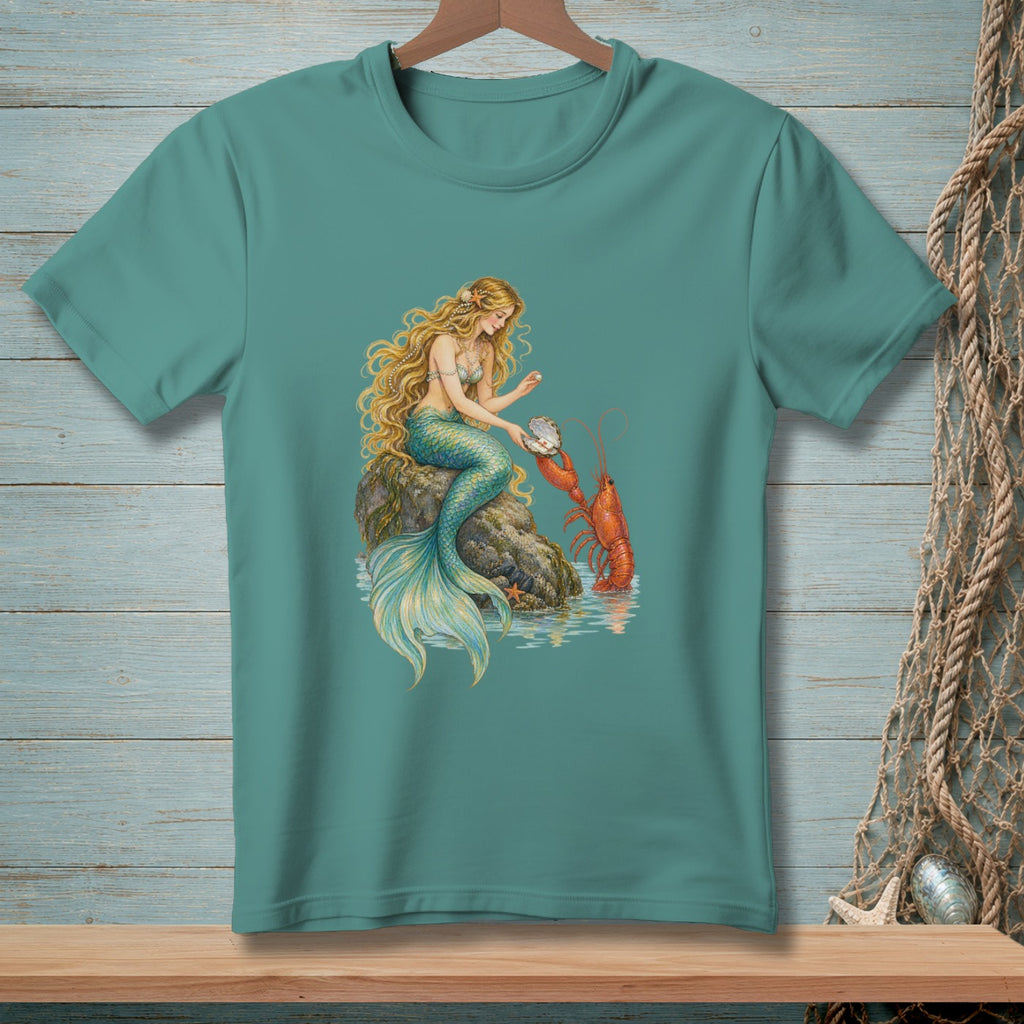 Mermaid holding pearl with lobster on rock in water, printed on a teal t-shirt.