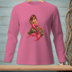 Pink long-sleeve shirt with a mermaid illustration sitting on a rock with a crab.