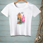 White t-shirt graphic with a mermaid, crab, and text "BE HUMBLE." and "ABOUT WHAT?".