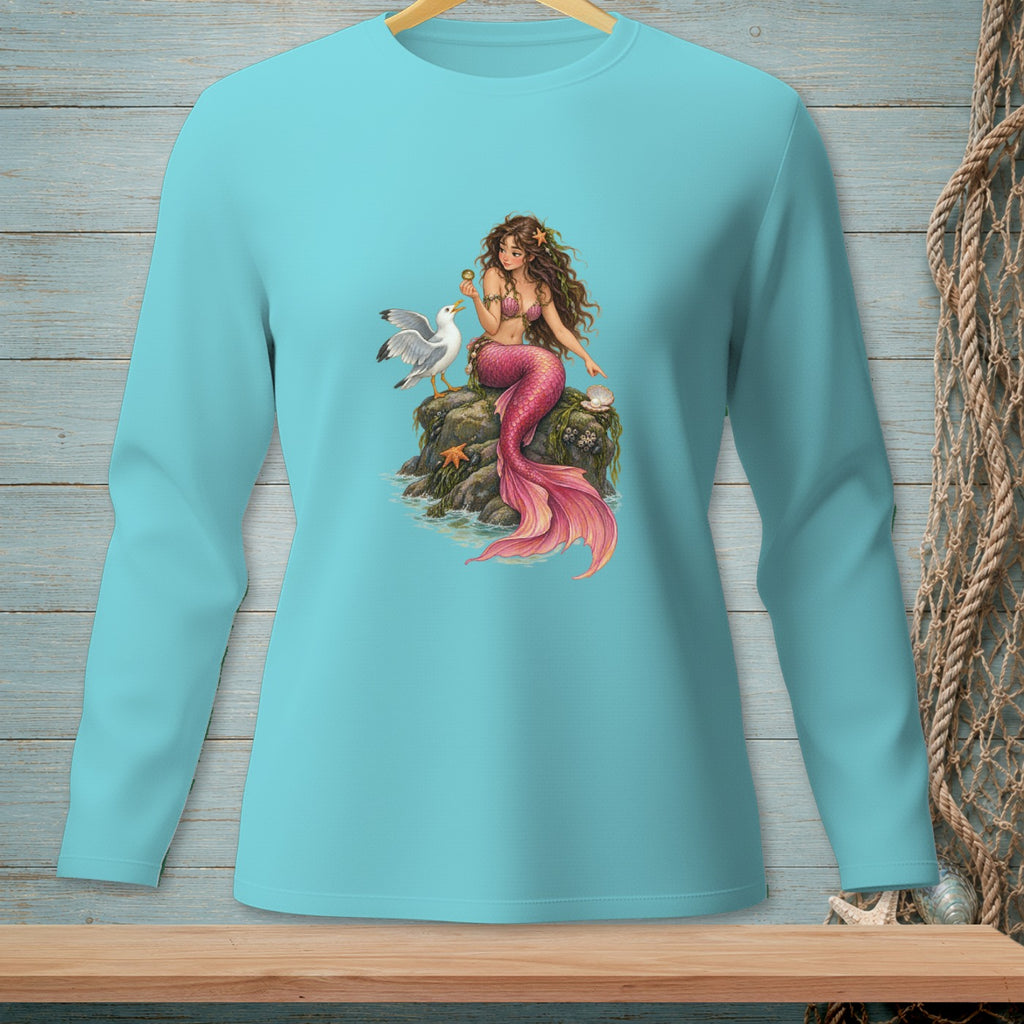 Aquamarine long-sleeve shirt with a mermaid sitting on a rock next to a seagull.