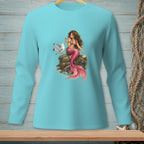 Aquamarine long-sleeve shirt with a mermaid sitting on a rock next to a seagull.