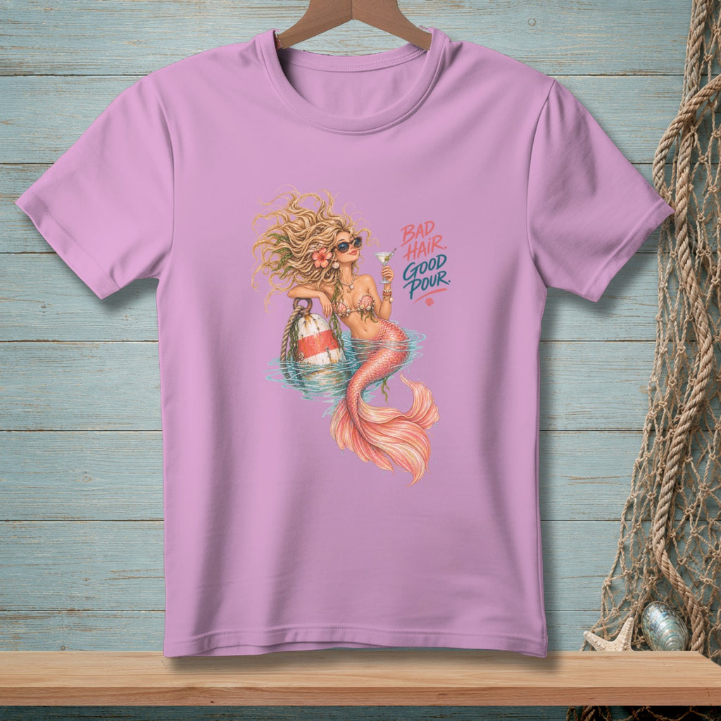 Pink t-shirt with mermaid graphic and text "BAD HAIR GOOD POUR."