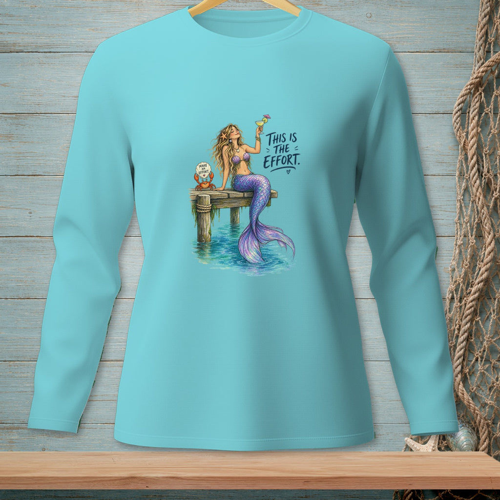 Mermaid with a cocktail on a dock, text "THIS IS THE EFFORT."