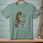 Mermaid with long hair and purple tail sitting on a dock, brushing a crab. "Save Yourself" text.