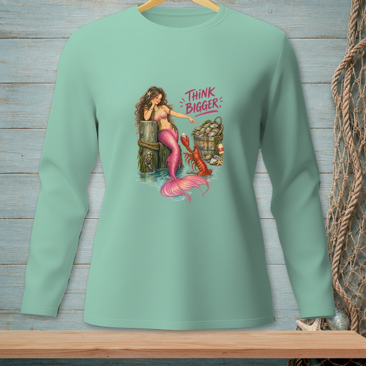 Mermaid pointing at a lobster next to bucket of oysters with "Think Bigger" text.