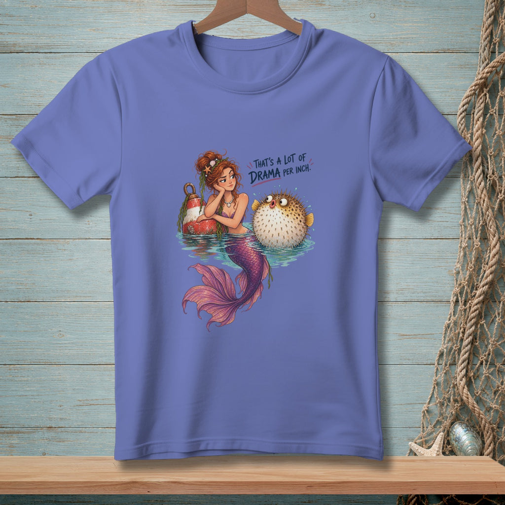 Mermaid with a pufferfish on a shirt that reads "That's a lot of drama per inch."
