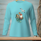 Mermaid with seagull and donuts on a buoy graphic on a teal long-sleeve shirt.