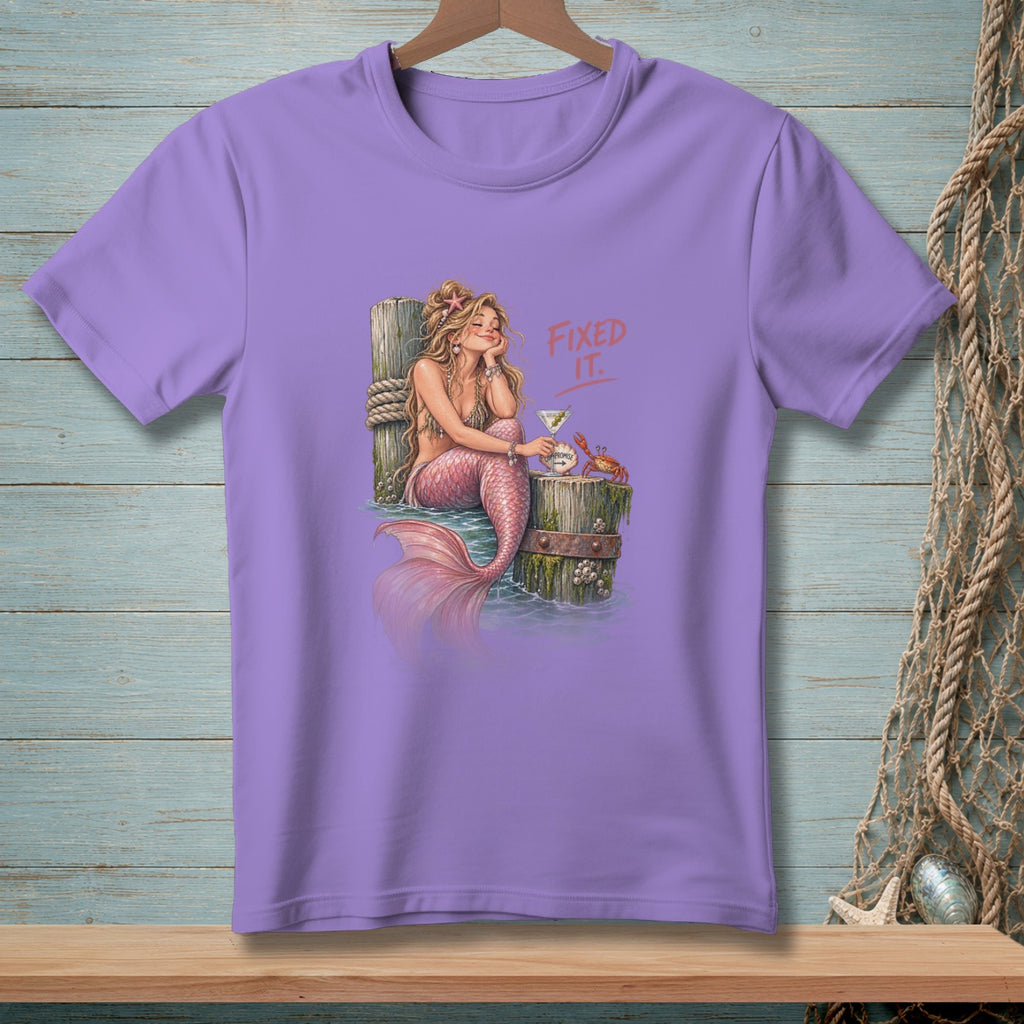 Purple t-shirt with a mermaid, martini, crab, and text "FIXED IT."