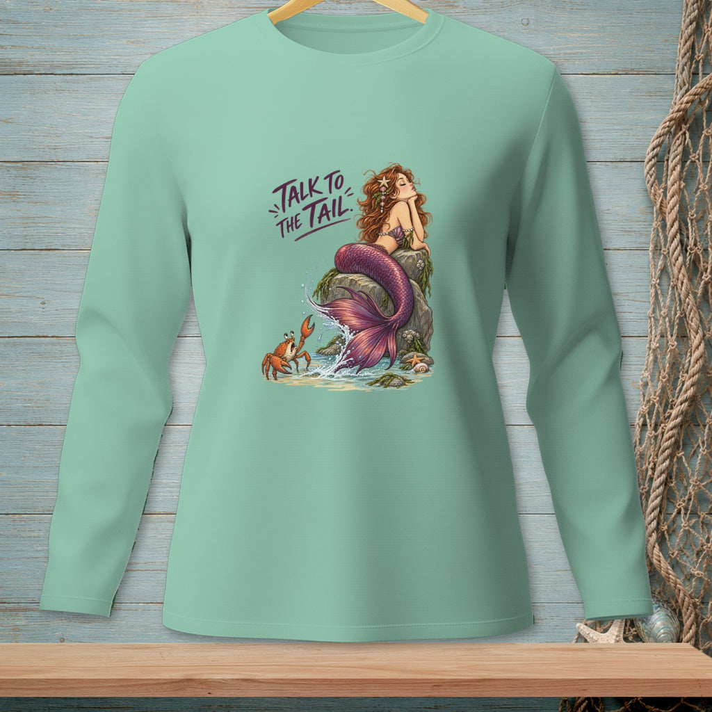 Mermaid with text "Talk to the Tail" sitting on a rock with a crab.