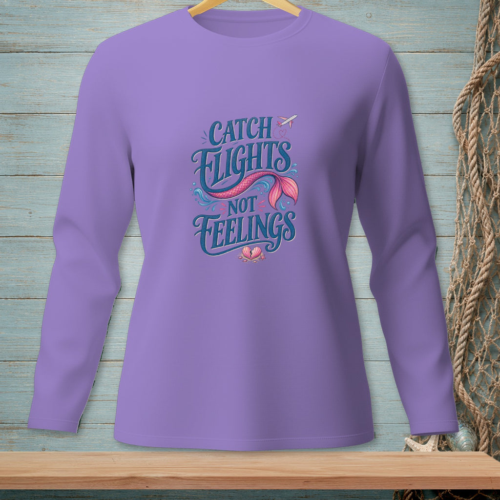 Lavender long-sleeve shirt with "Catch Flights Not Feelings" mermaid tail graphic.