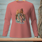 Two mermaids sit on a pier, one holding flowers, the other a drink.