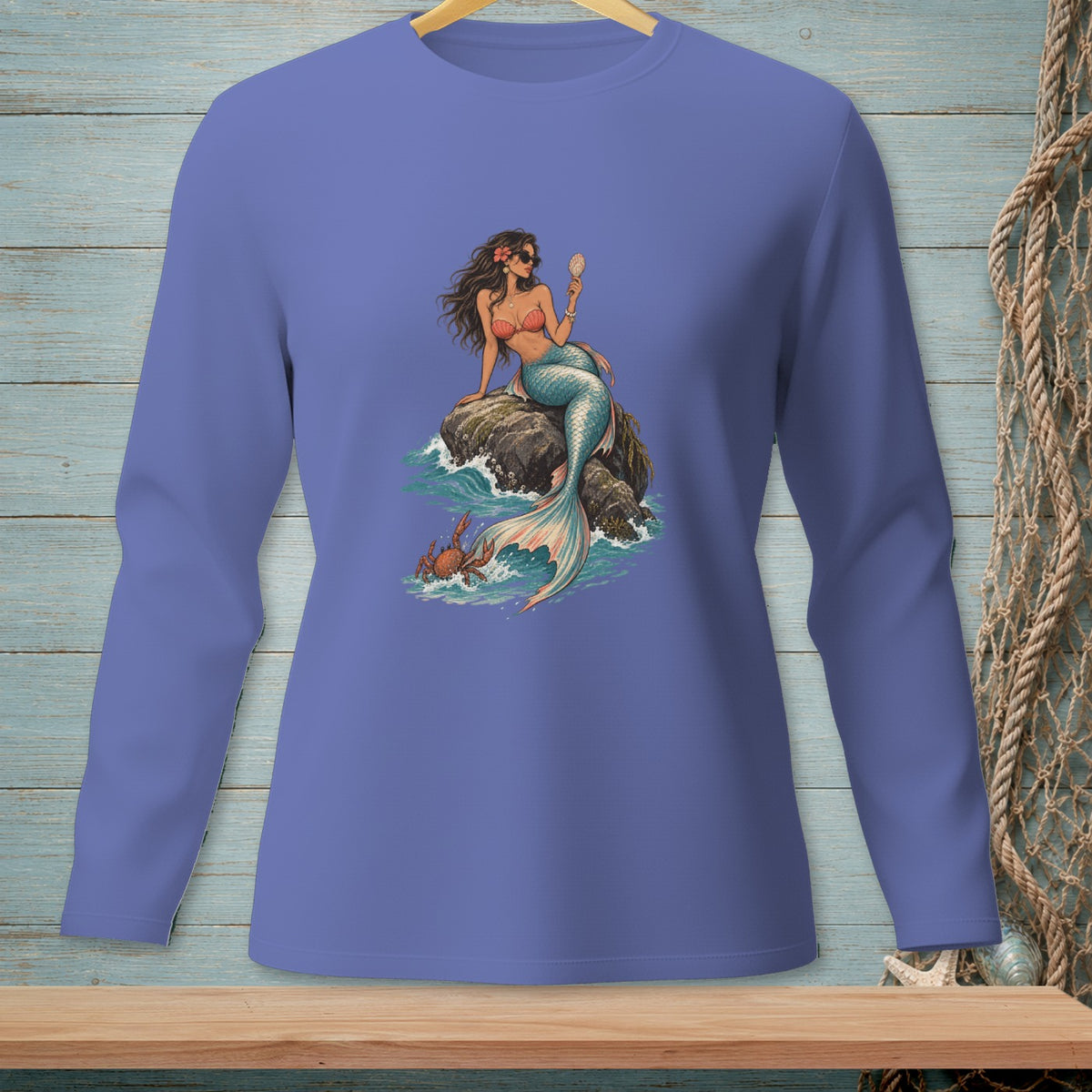 Illustration of a mermaid with sunglasses and a seashell, sitting on a rock with a crab.