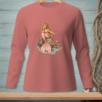 Pink long-sleeve shirt with a graphic of a mermaid sitting on a rock with a crab.