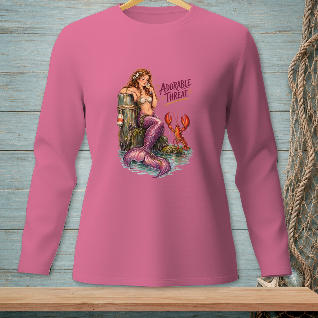 Mermaid and lobster graphic with text "Adorable Threat" on pink shirt.