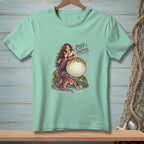 Mermaid sitting on rock with pufferfish, text "Puff Happens".