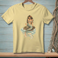 Yellow t-shirt with a vintage illustration of a mermaid on a rock.