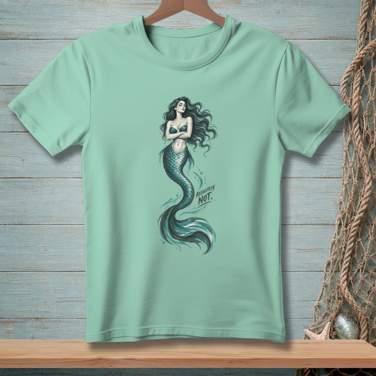 Mint t-shirt with a mermaid graphic and the text "ABSOLUTELY NOT."