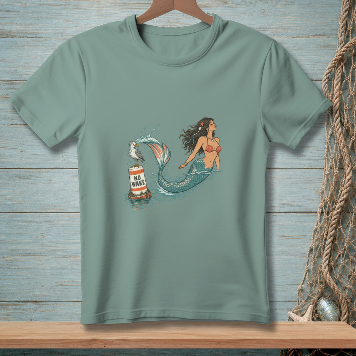 Mermaid and seagull on a "NO WAKE" buoy in the water.