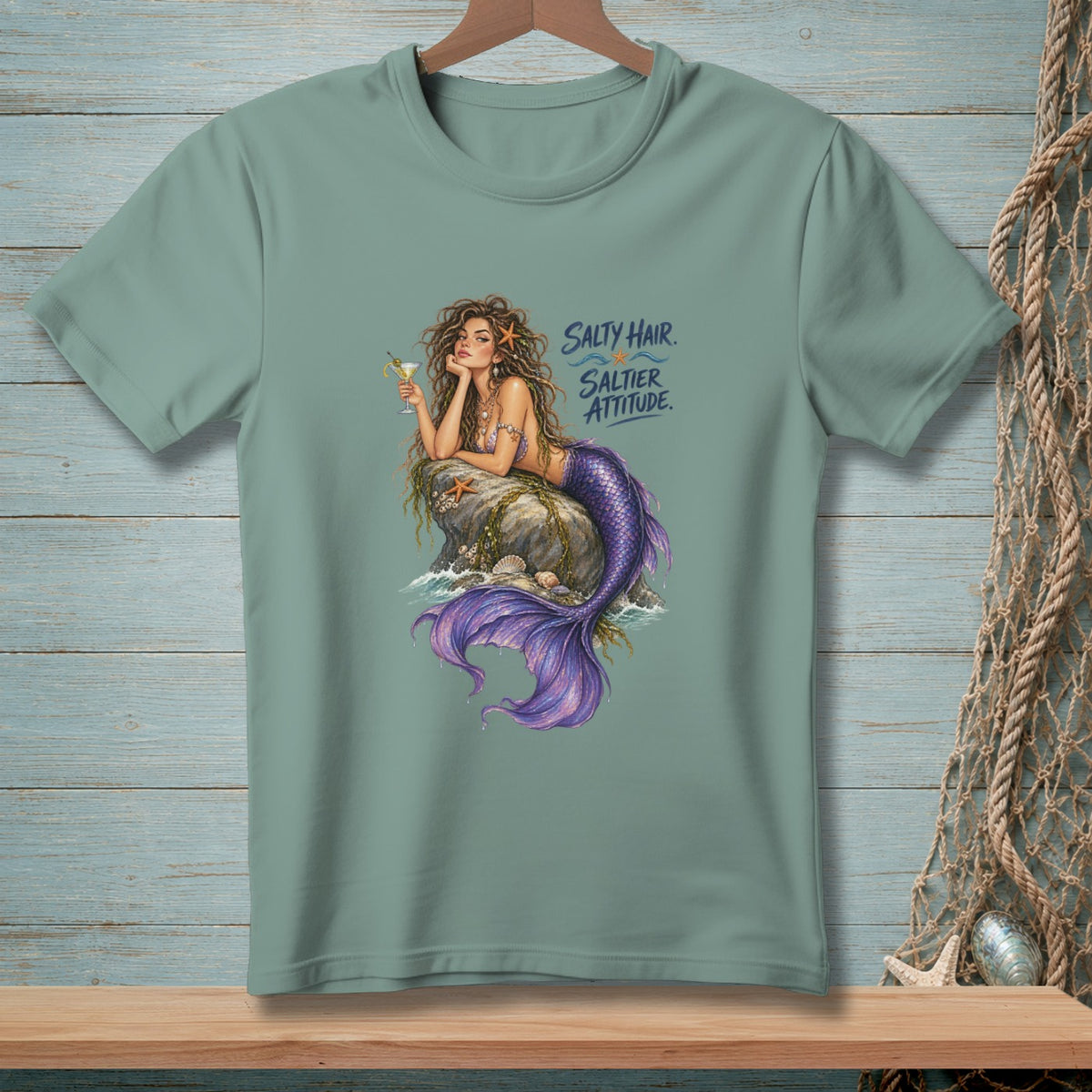 Mermaid with purple tail holding a drink, text "Salty Hair. Saltier Attitude."