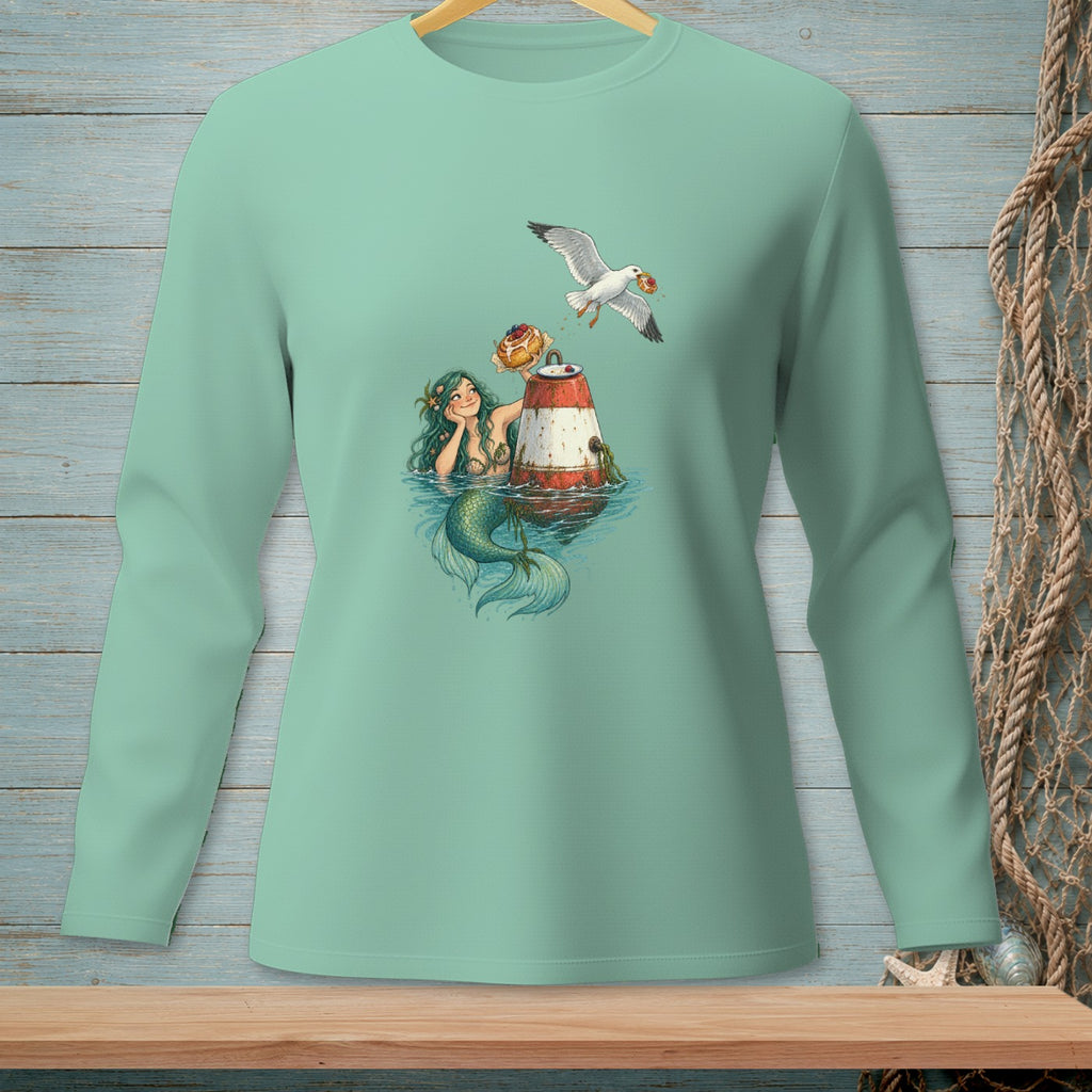 Mermaid with donut and seagull on a buoy design on a mint green long-sleeve shirt.
