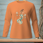 Orange long-sleeve shirt with a watercolor mermaid graphic holding "Drama" and "Drinks" signs.