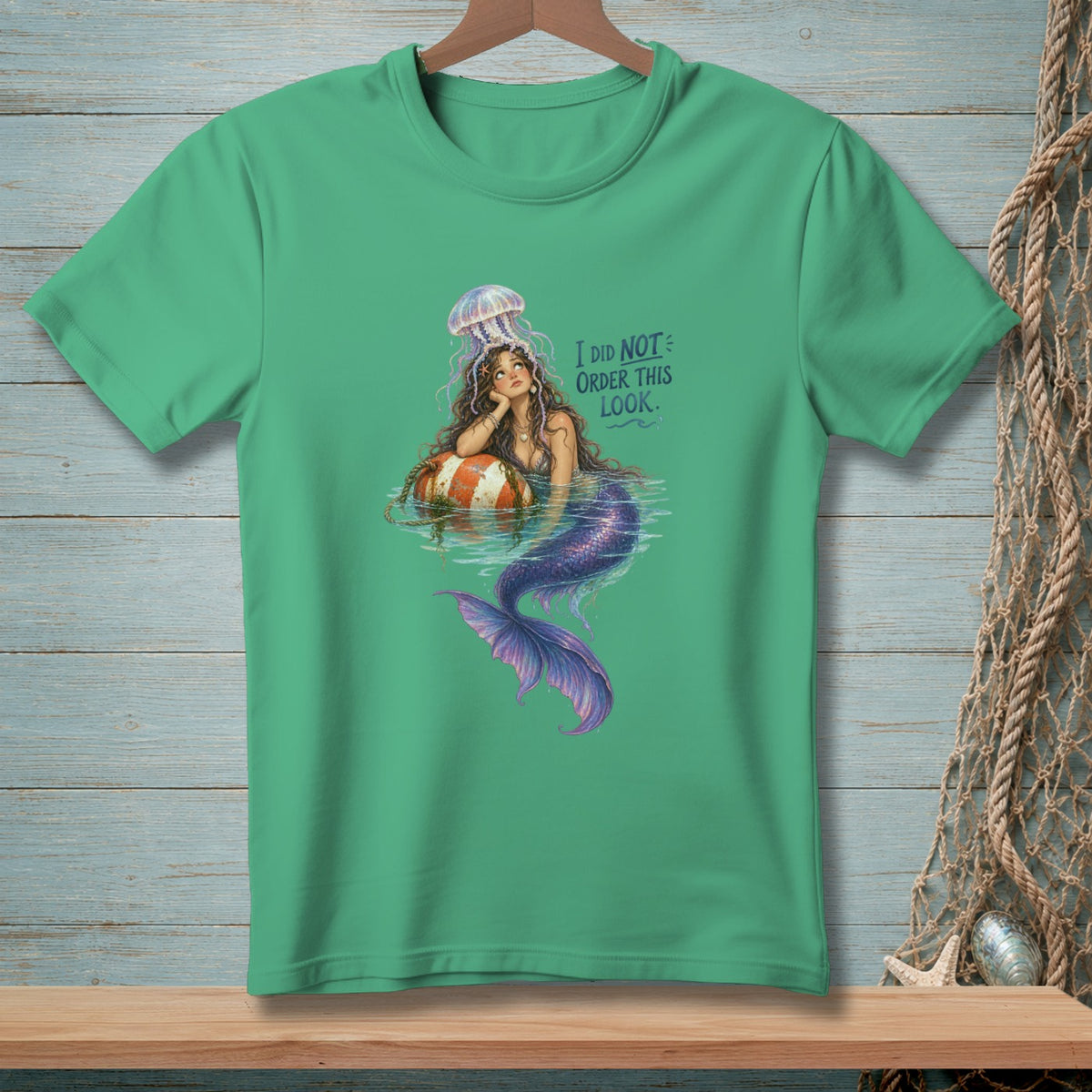 Green t-shirt with mermaid and jellyfish graphic and text "I DID NOT ORDER THIS LOOK."