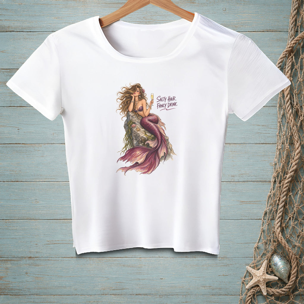 White t-shirt with mermaid graphic and text "Salty Hair, Fancy Drink."