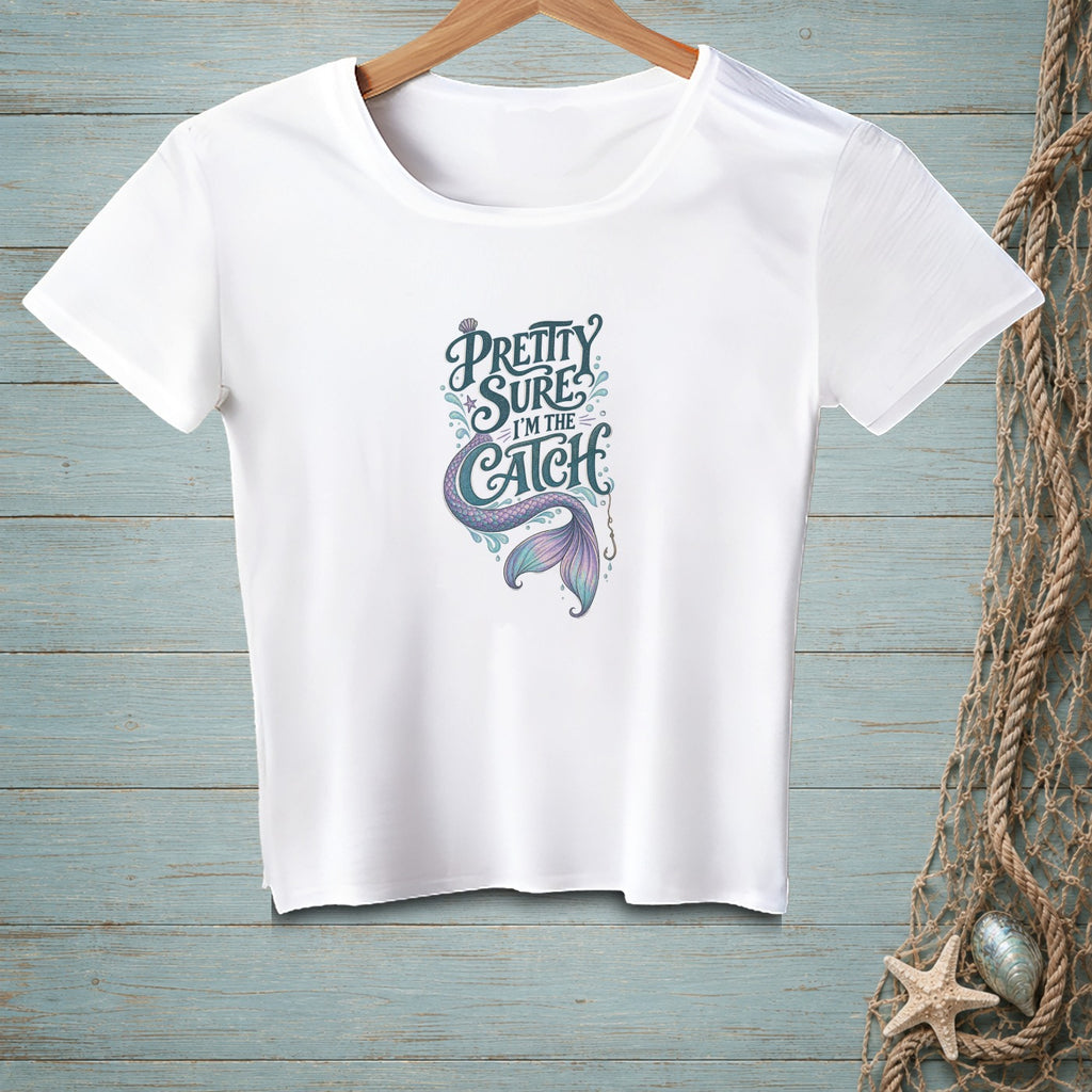 White t-shirt with "Pretty sure I'm the catch" text and mermaid tail design.