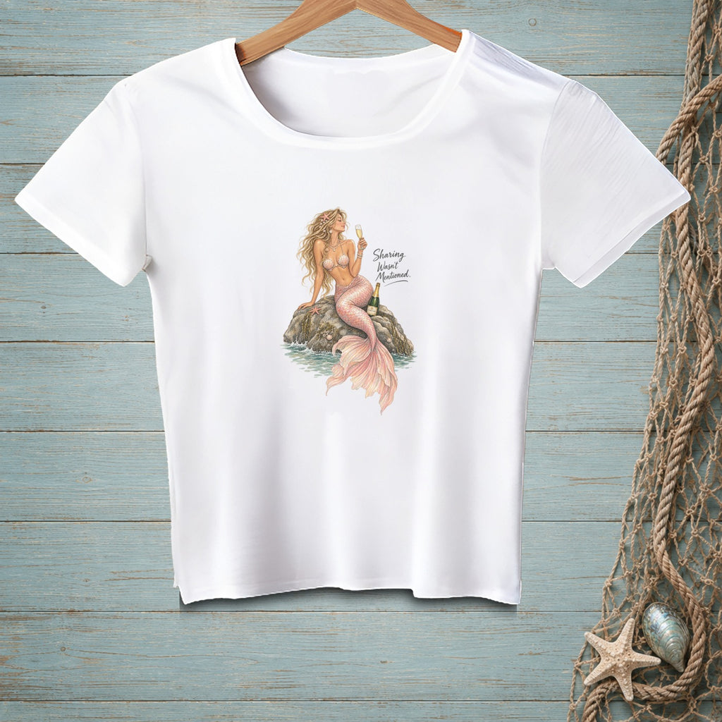 White t-shirt with a mermaid illustration and the text "Sharing Wasn't Mentioned."