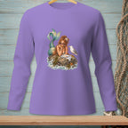 Long sleeve purple shirt with a graphic of a mermaid and seagull on a rock.