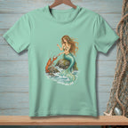 Mermaid on rocks with lobster and pearls, mint green t-shirt graphic.