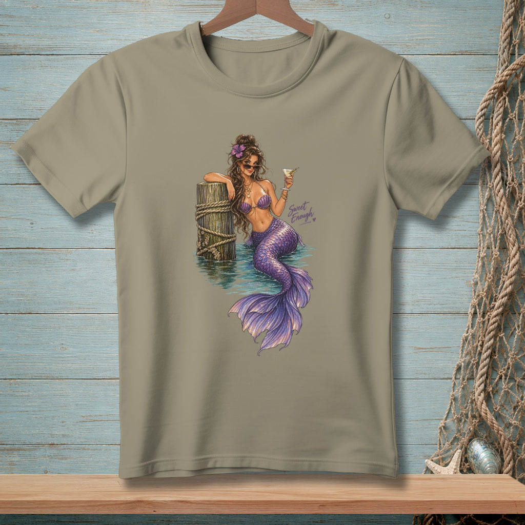 Tan t-shirt with a mermaid leaning on a post, holding a drink. Text reads "Sweet Enough".