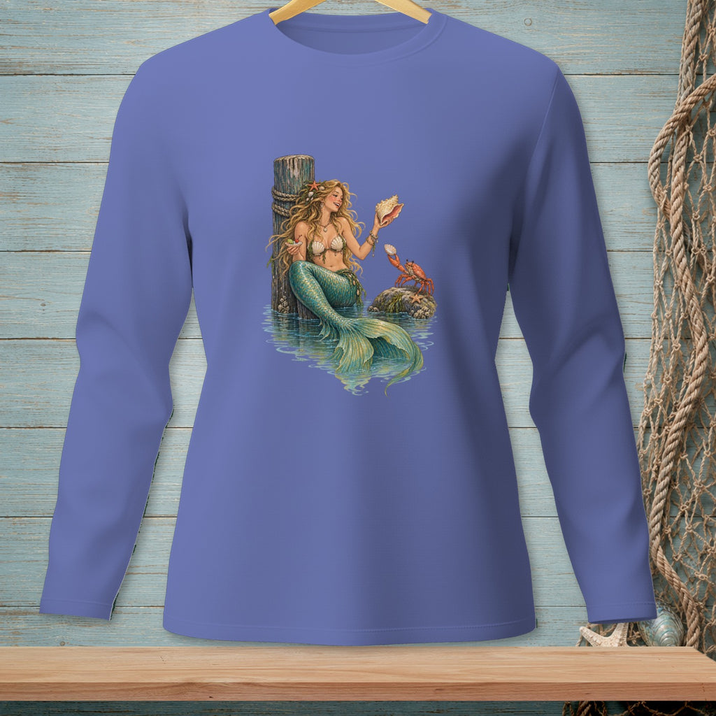 Mermaid holding a seashell sits by a wooden post with a crab nearby.