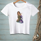 White t-shirt with a mermaid sitting on a wooden post with a crab.