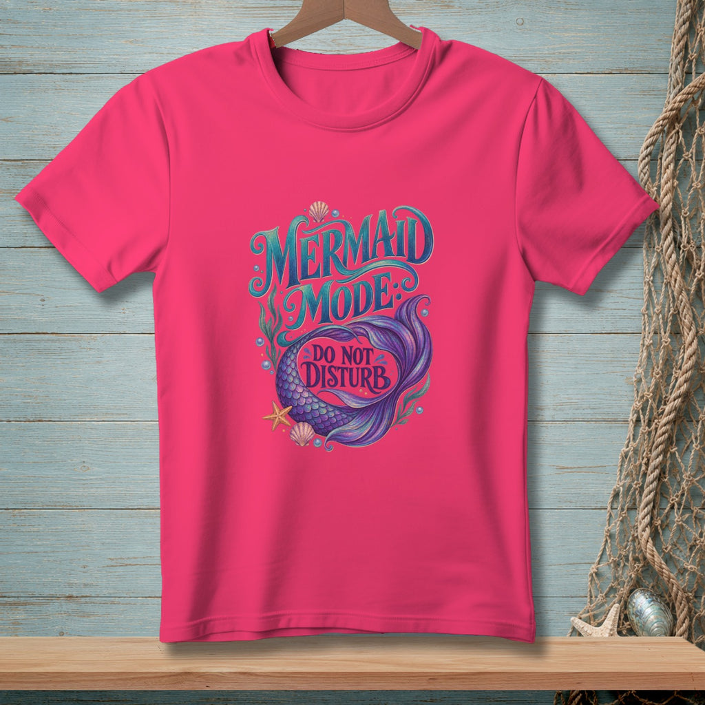 Pink t-shirt with "Mermaid Mode Do Not Disturb" text and mermaid tail.