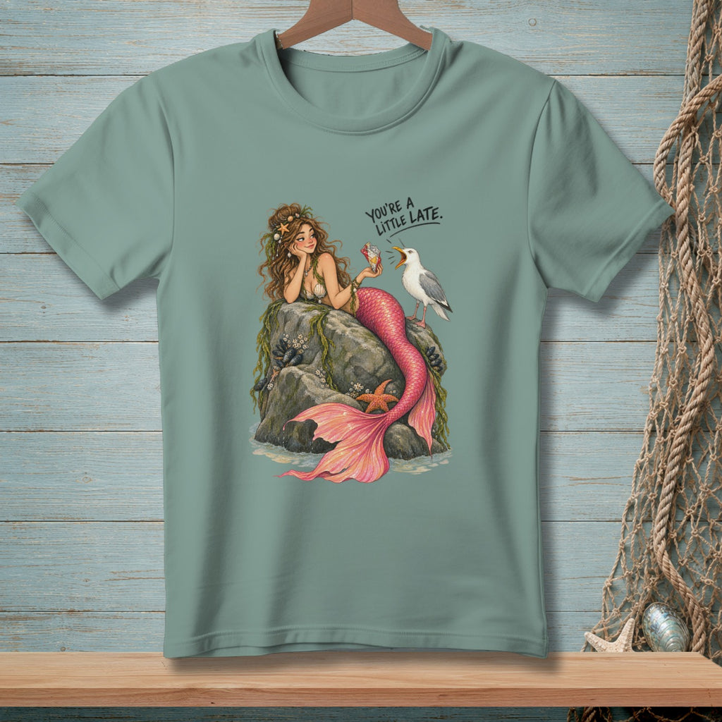 Mermaid on rocks with a seagull, text "You're a little late."