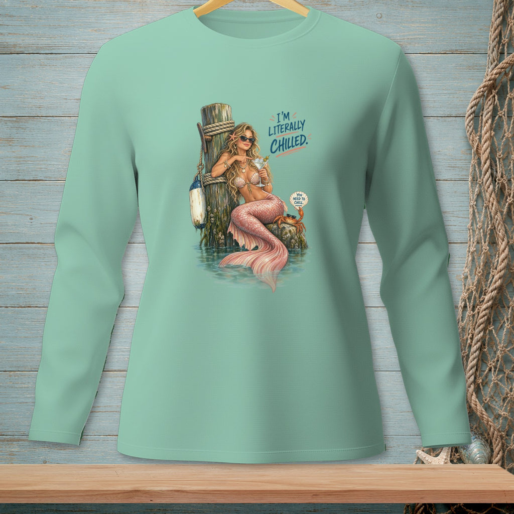 Mermaid with a drink leaning on a pier, text "I'M LITERALLY CHILLED."