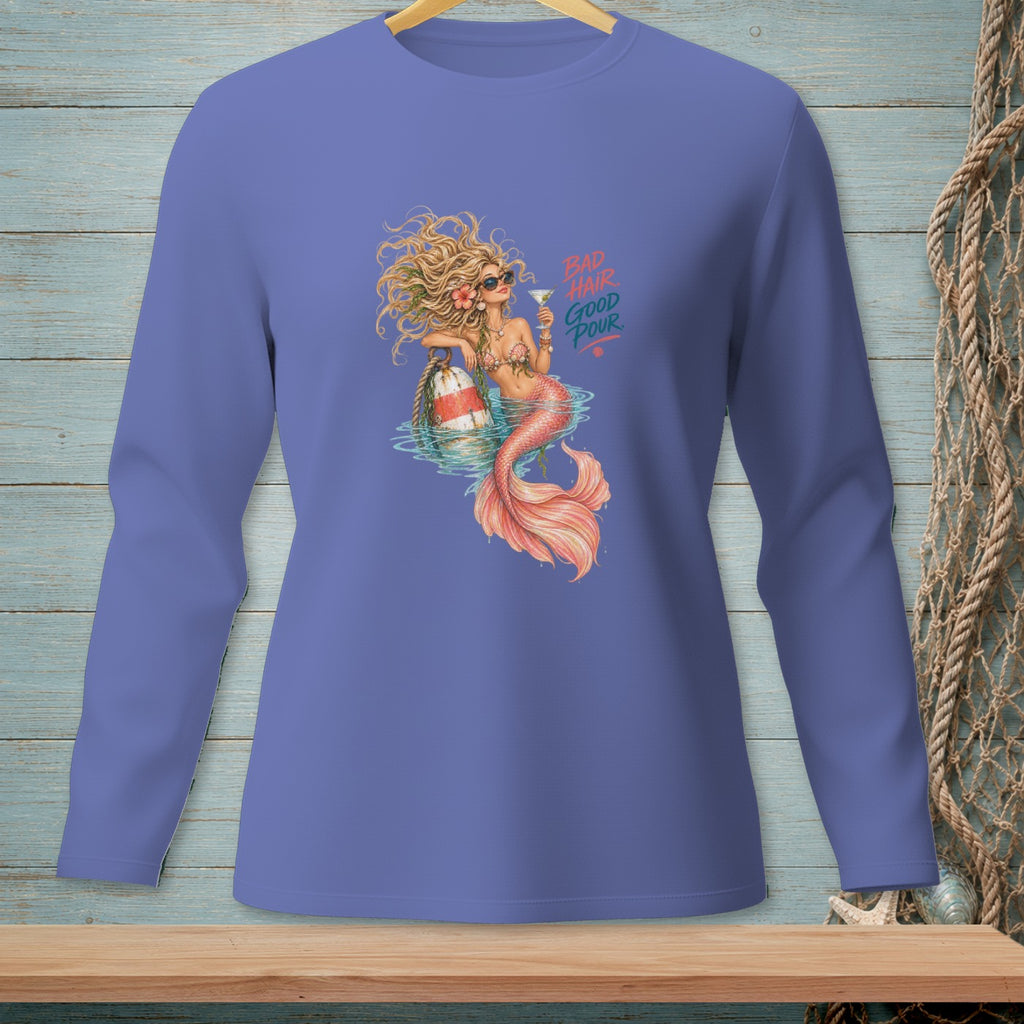 Mermaid with cocktail and buoy says "Bad Hair Good Pour" on blue shirt.