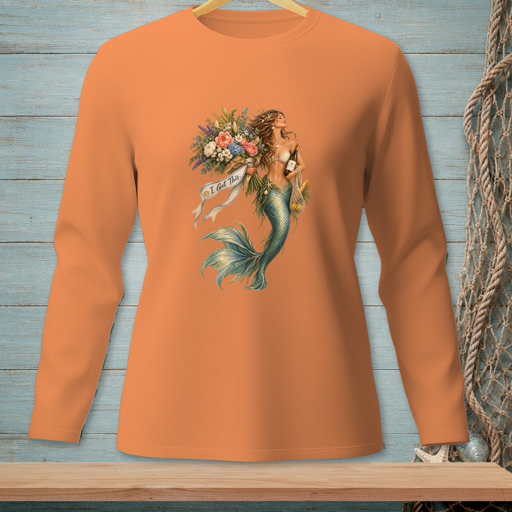 Orange long-sleeve shirt with a graphic of a mermaid holding flowers and a bottle of wine.